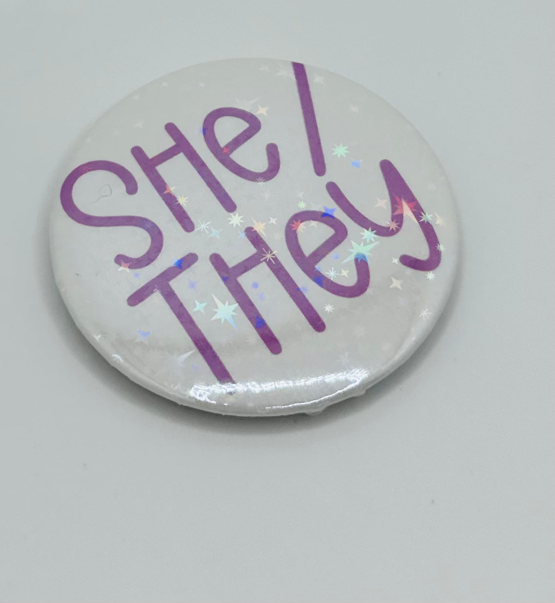 Holographic She/They Pronoun Buttons